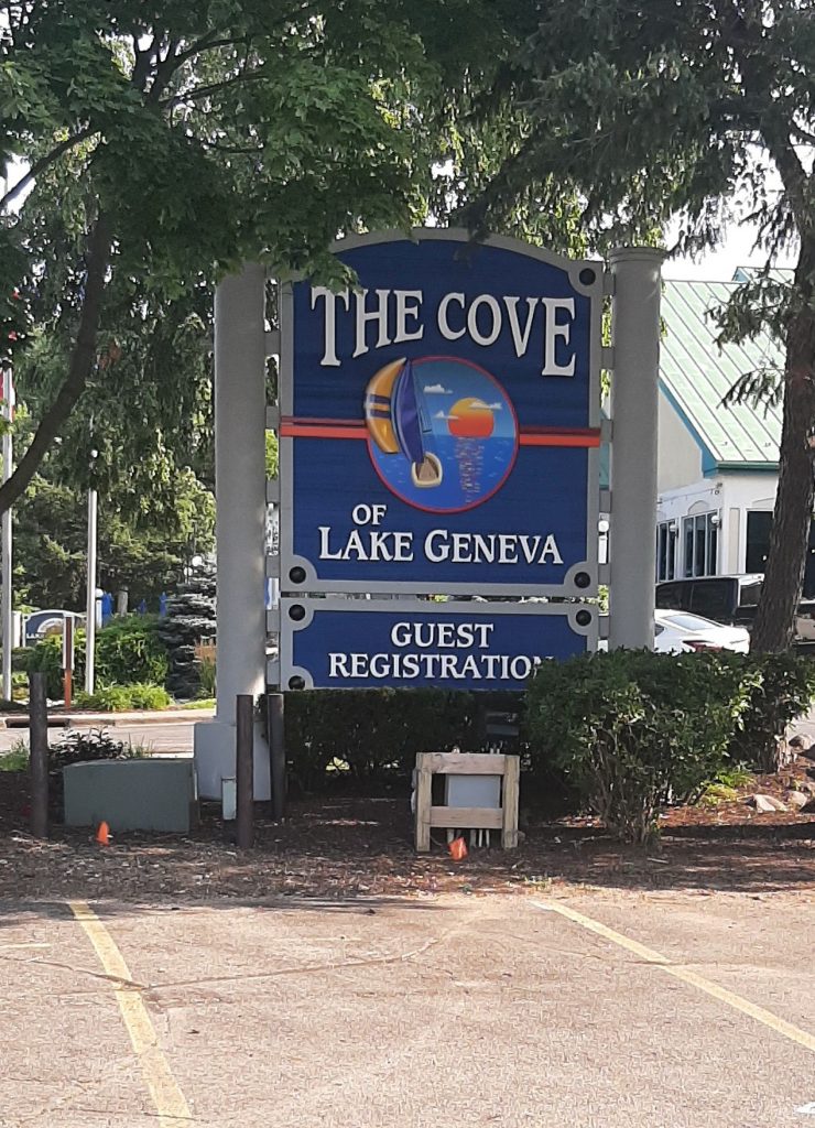 Sign for The Cove hotel, no other text.